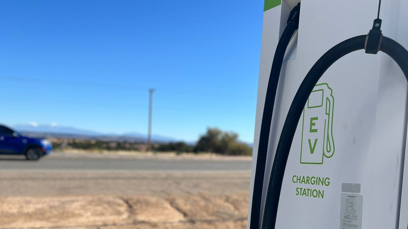 EV charging station with mountains in the background