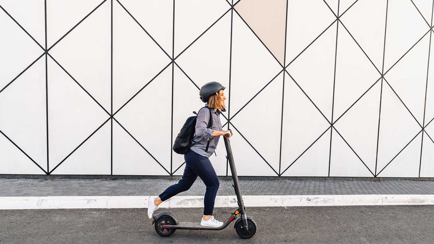 Woman on electric scooter